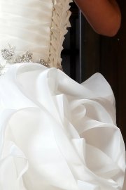 Deluxe Strapless Ruffled Organza Wedding Gown